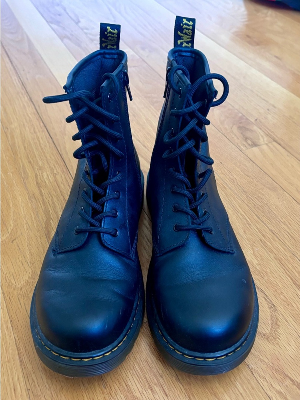 Dr. Martens Black Leather Boots with Yellow Heel Loop